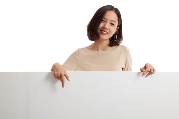 Young Asian woman point to a  blank sign — Stock Photo, Image