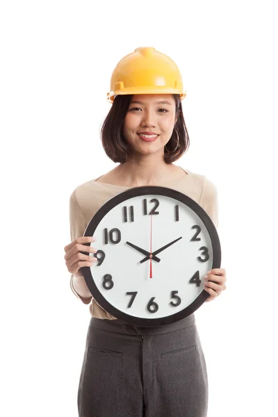 Asian engineer woman with a clock — Stock Photo, Image