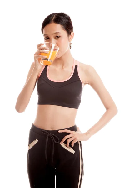 オレンジ ジュースを飲むアジア健康的な美少女 — ストック写真