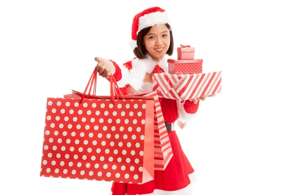 Asiática Navidad Santa Claus chica con bolsas de compras y regalo —  Fotos de Stock