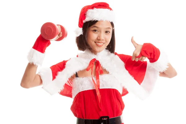 Asiático Natal Papai Noel menina polegares para cima com halteres vermelhos — Fotografia de Stock