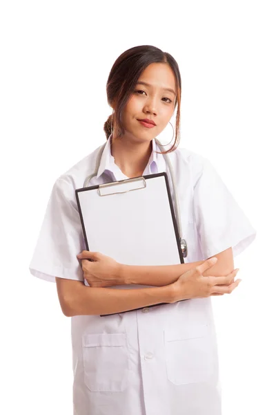 Asian young female doctor hold a clipboard — Stock Photo, Image