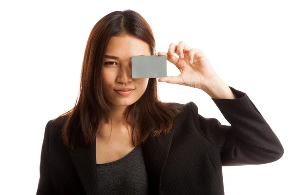 Young Asian business woman with  blank card over her eye. — Stock Photo, Image