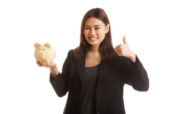 Asiática mujer de negocios pulgares arriba con cerdo moneda banco . — Foto de Stock