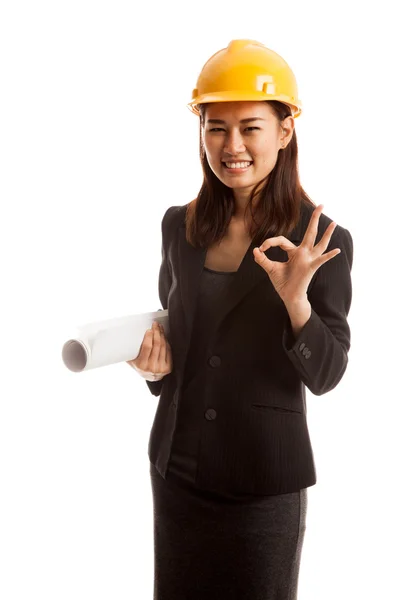 Asian engineer woman with blueprints show OK hand sign. — Stock Photo, Image