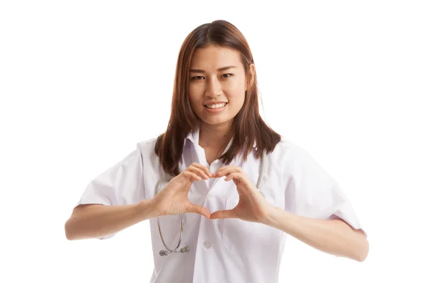 Portrait of Asian female doctor show heart hand sign. — Stock Photo, Image