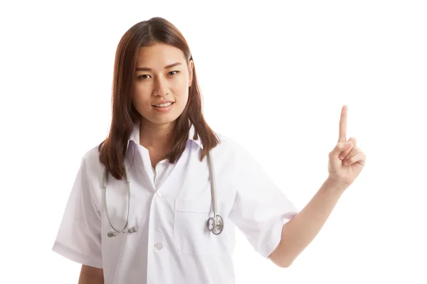 Asiatische junge Ärztin verweisen auf Leerstellen. — Stockfoto