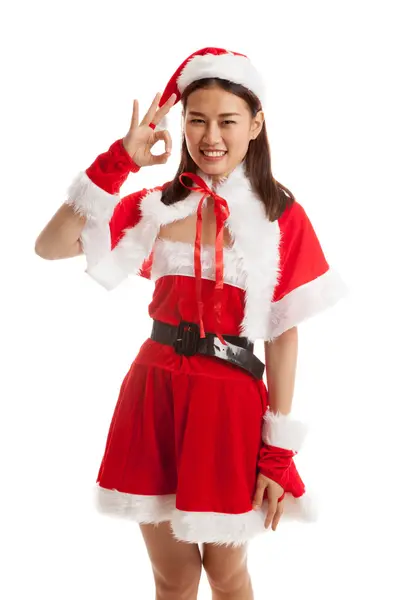 Aziatische kerst Santa Claus meisje Ok ziekteverschijnsel vertonen. — Stockfoto