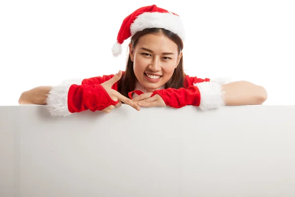 Asiatico Natale Santa Claus ragazza punto verso il basso per segno in bianco . — Foto Stock