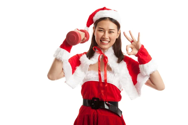 Asiático Navidad santa claus chica espectáculo ok con rojo dumbbell . —  Fotos de Stock
