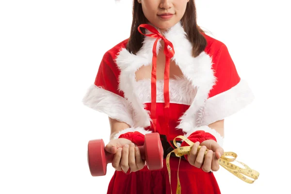 Asiatische Weihnachten Weihnachtsmann Mädchen mit Maßband und Dumbbel — Stockfoto