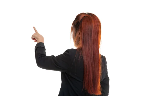 Back of Asian business woman touching the screen with her finger — Stock Photo, Image