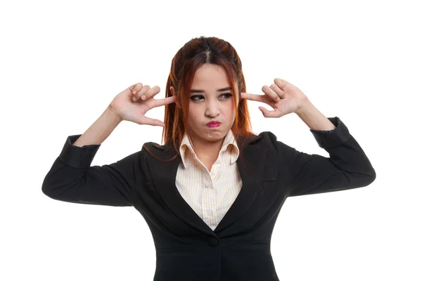 Young Asian woman block both ears with fingers. — Stock Photo, Image