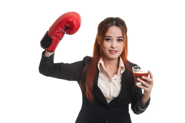 Young Asian business woman with tomato juice and boxing glove. — Stock Photo, Image