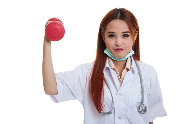 Young Asian female doctor with dumbbell. — Stock Photo, Image
