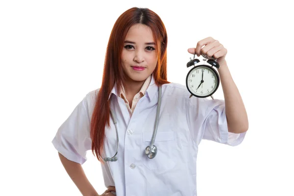 Young Asian female doctor happy show a clock. — Stock Photo, Image