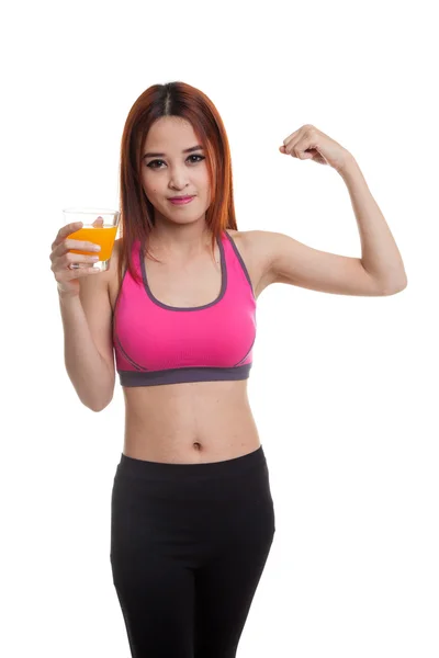 Schön asiatische gesunde Mädchen trinken Orangensaft flexing bi — Stockfoto