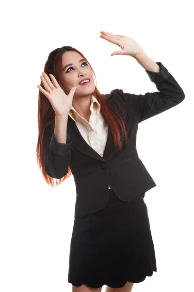 Excited young Asian business woman look up. — Stock Photo, Image