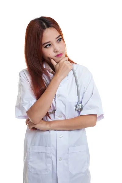 Thoughtful, Young Asian female doctor. — Stock Photo, Image