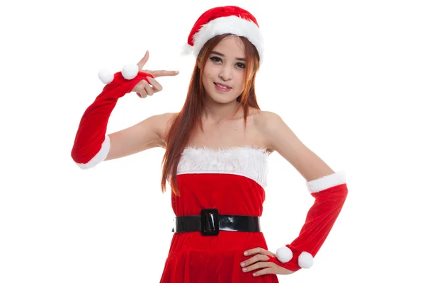 Asiático Natal Papai Noel menina ponto para espaço em branco . — Fotografia de Stock