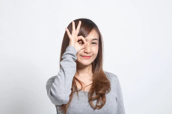 Schön Junge Asiatische Frau Zeigen Zeichen Über Ihr Auge Auf — Stockfoto