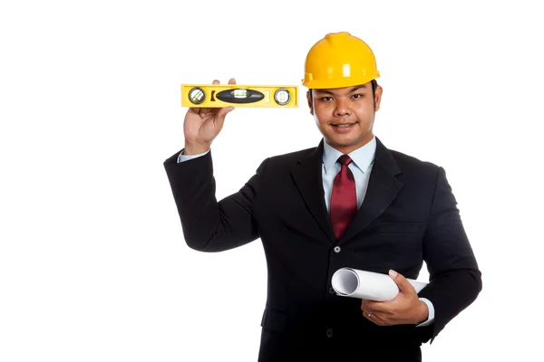 Asian engineer man  hold blue print and level look at camera — Stock Photo, Image