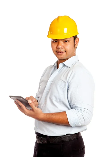 Asian engineer man use his tablet and smile look at camera — Stock Photo, Image