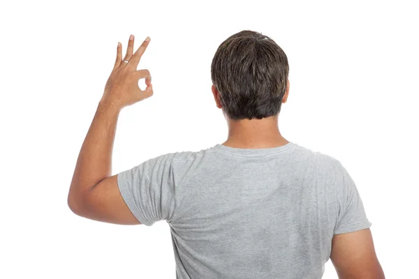 Back of Asian strong man show ok sign — Stock Photo, Image