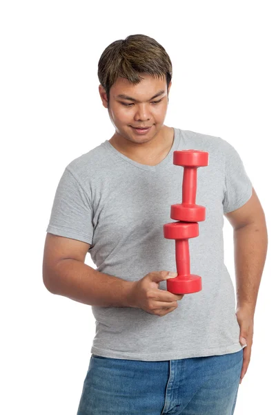 Asiático fuerte hombre equilibrio mancuernas — Foto de Stock