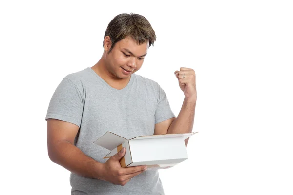 Asian man happy look to an open box — Stock Photo, Image