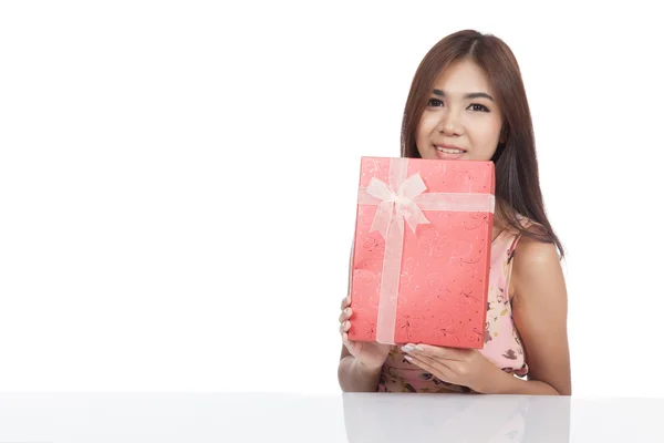 Beautiful Asian woman with red gift box — Stock Photo, Image