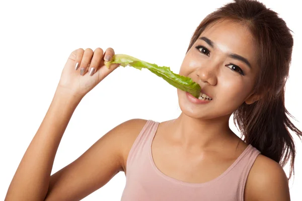 Asian healthy girl bite , eat vegetable — Stock Photo, Image
