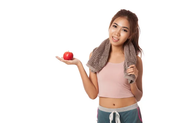 她手掌手上亚洲健康锻炼的女孩显示红苹果 — 图库照片