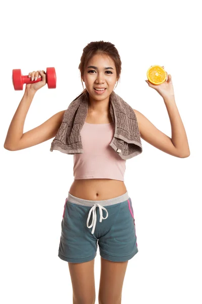 Asian healthy workout girl with orange and dumbbell — Stock Photo, Image