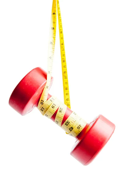 Red dumbbells weight with measuring tape — Stock Photo, Image