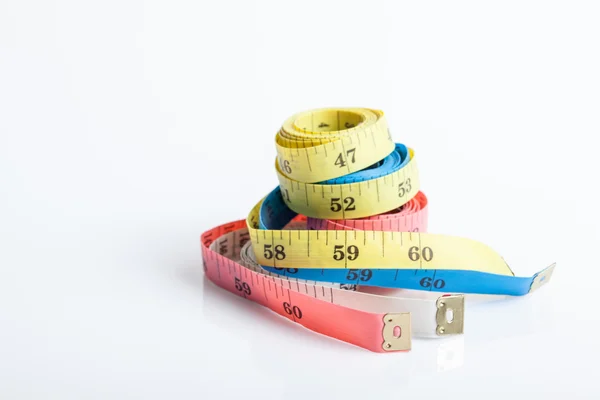 Four colorful  measuring tapes — Stock Photo, Image