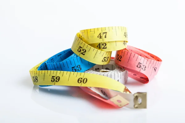 Quatro fitas de medição coloridas — Fotografia de Stock
