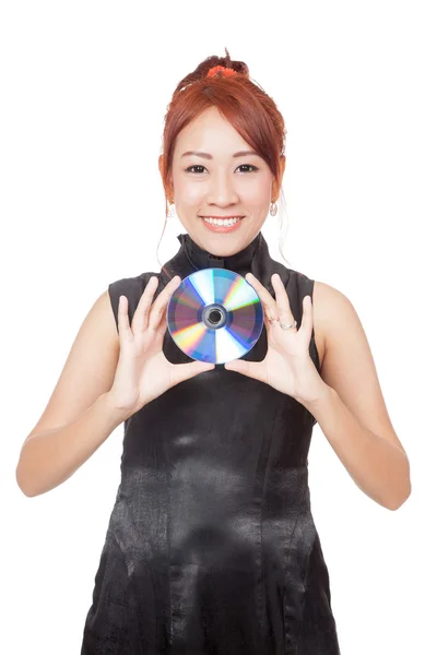 Asian girl hold a disc with her both hands and smile — Stock Photo, Image