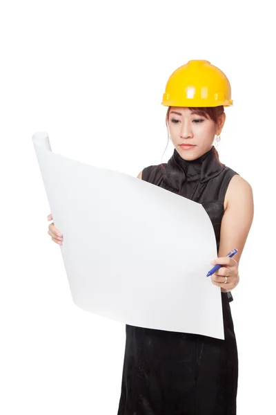 Asian architect girl read a blueprint seriously — Stock Photo, Image