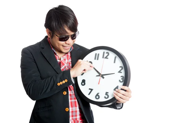 Asian man move minute hand clock and smile — Stock Photo, Image