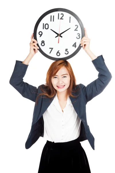 Asian businesswoman hold a clock over head — Stock Photo, Image