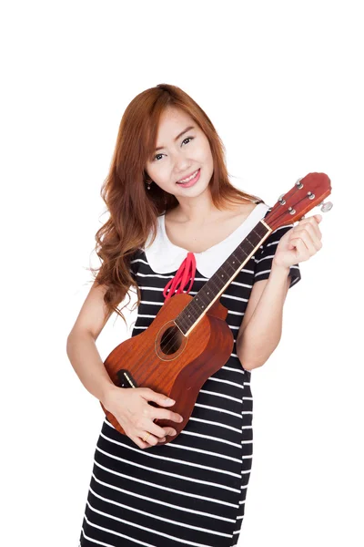 Asian girl tune ukulele — Stock Photo, Image