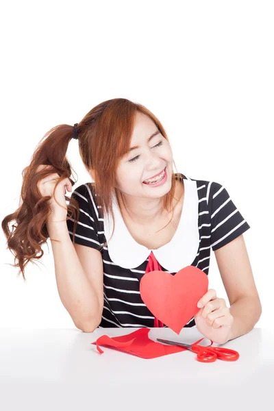 Asian girl shy cut heart shape paper — Stock Photo, Image