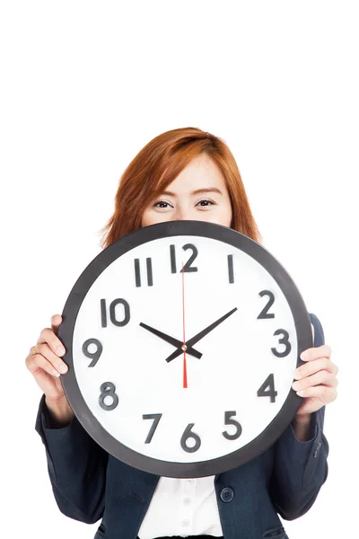 Asian businesswoman show clock face Royalty Free Stock Images