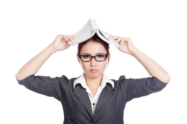Asian business woman headache put a book on her head