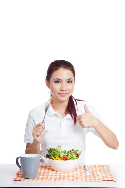 Asian girl eat salad show thumbs up — Stock Photo, Image