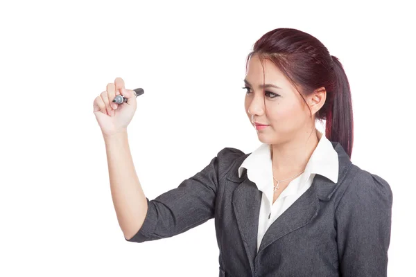 Young asian girl writing with black pen in the air — Stock Photo, Image