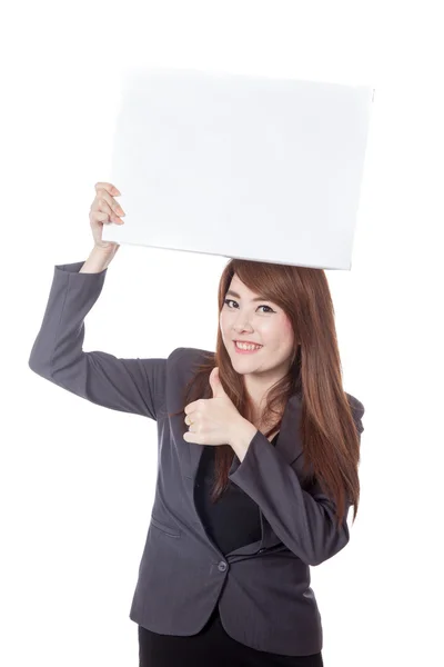 亚洲女商人竖起大拇指举行一个空白的标志顶 — 图库照片