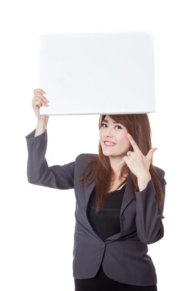 Asian businesswoman  point to a blank sign over head — Stock Photo, Image