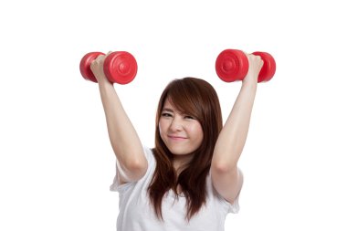 Mutlu Asyalı kız Asansör dumbbells onun Merkez over
